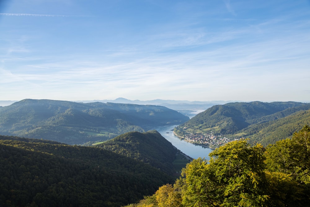 a scenic view of a valley and a river