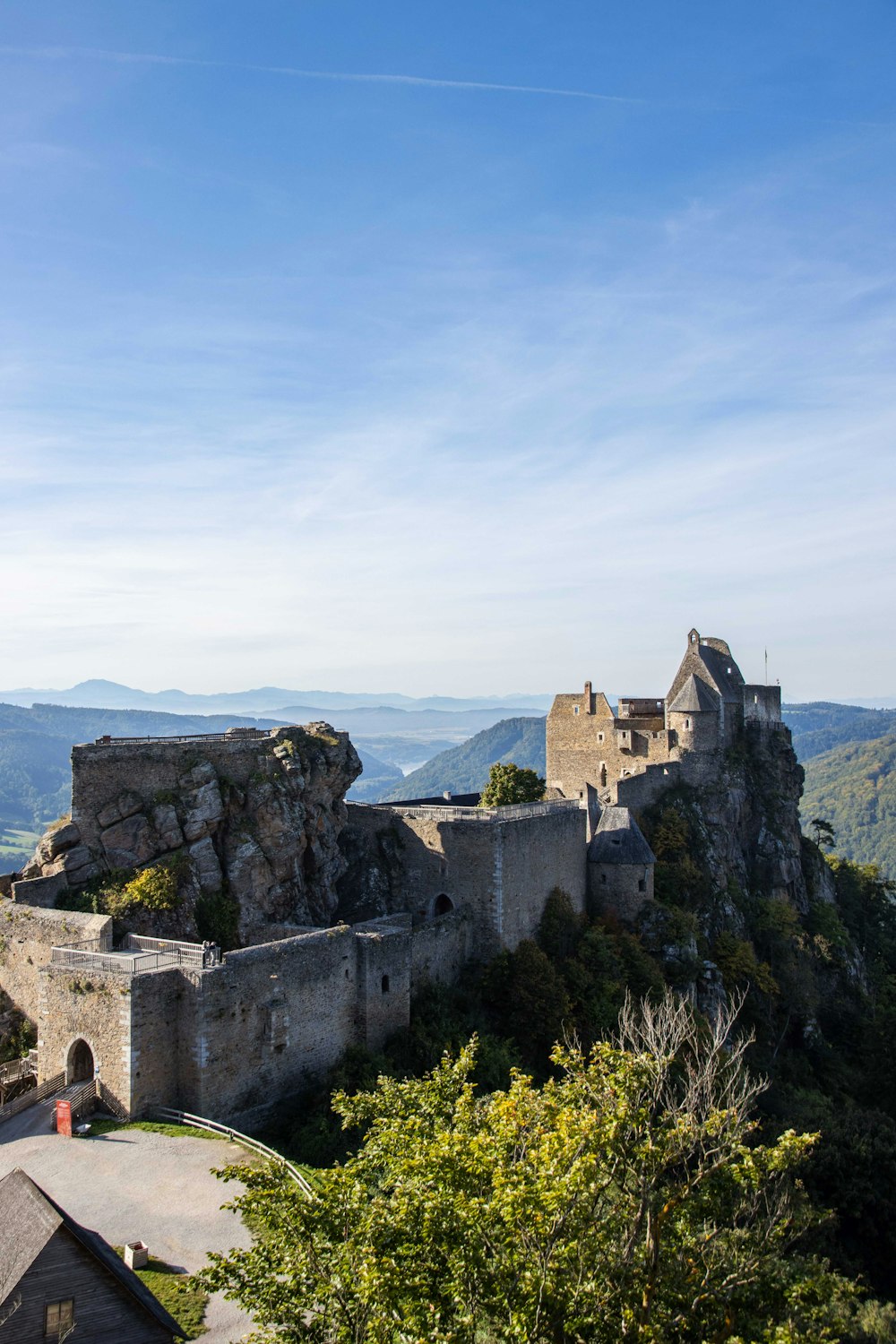 a castle perched on top of a mountain