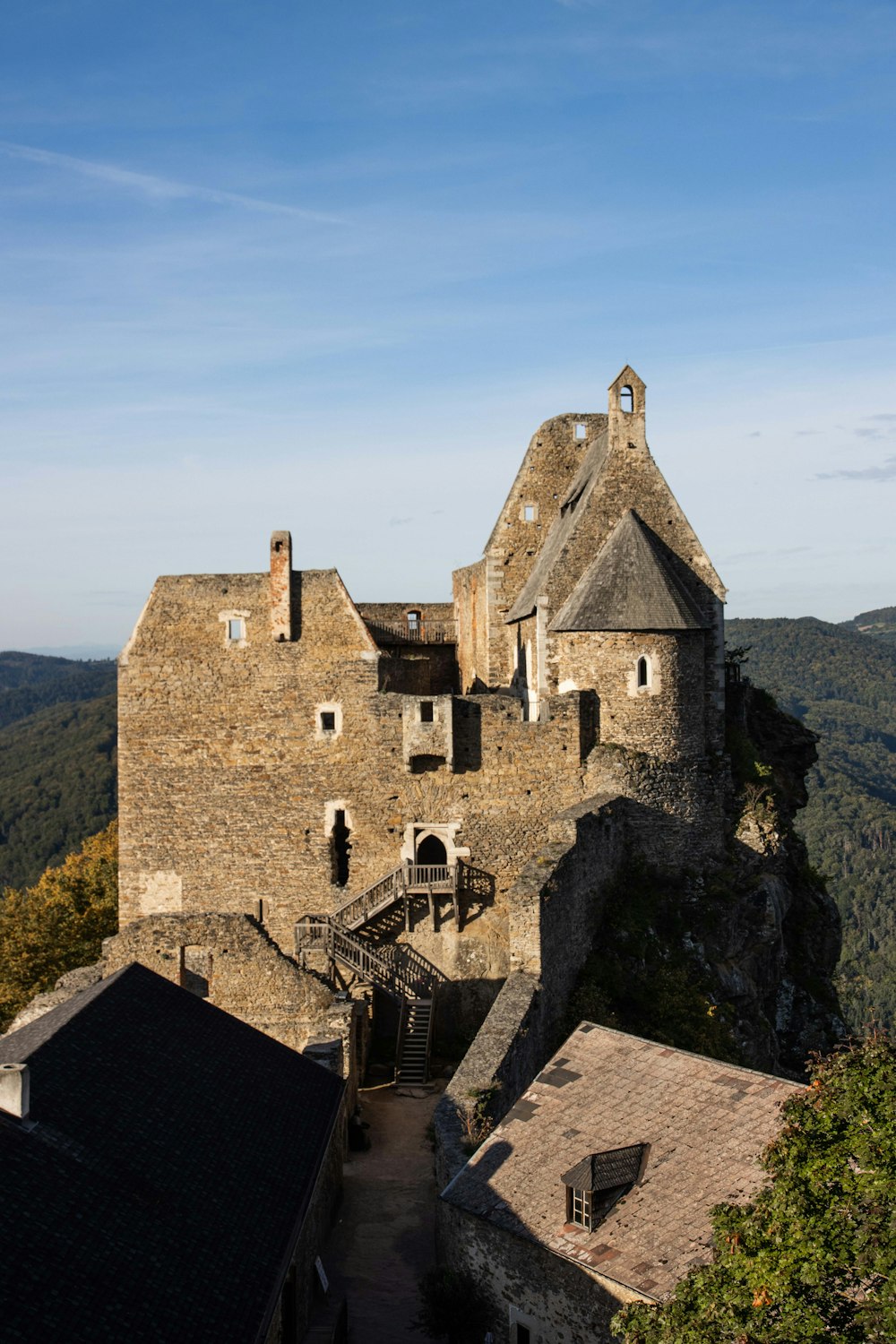 an old castle with a steeple on top of it