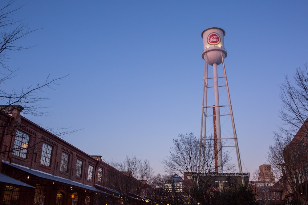 a water tower in the middle of a town