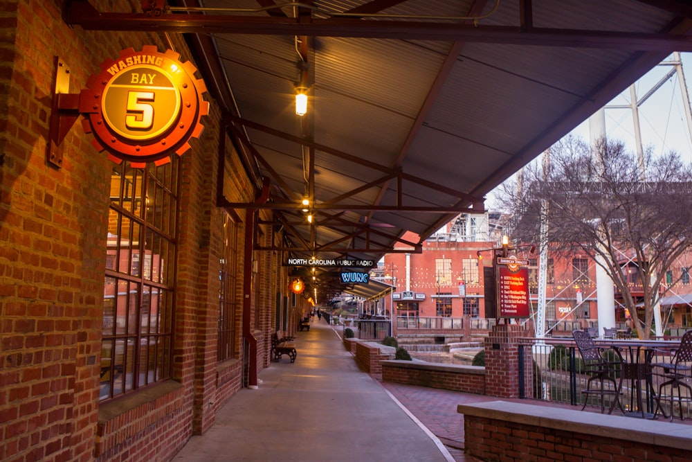 a brick building with a sign that says 5 on it