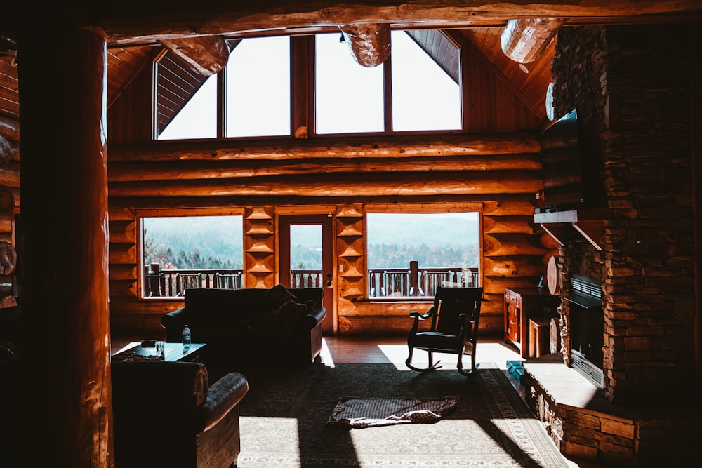 a living room filled with furniture and a fire place