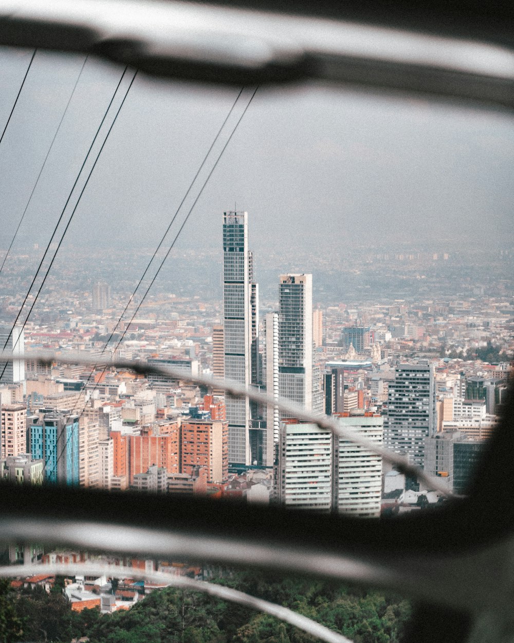 a view of a city from the top of a hill