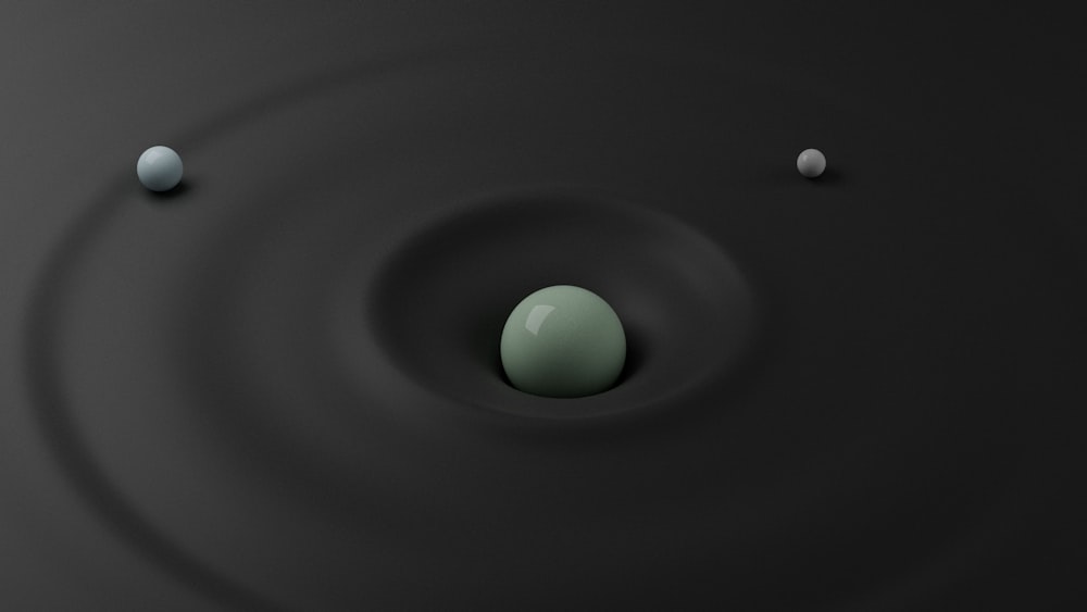 um grupo de bolas flutuando em um círculo preto