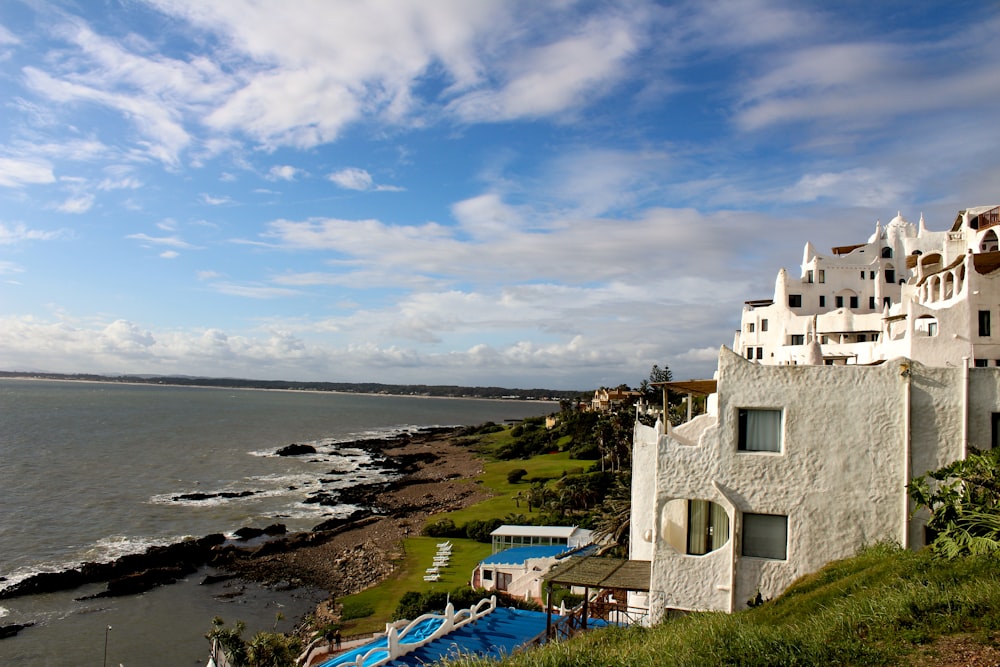 a view of the ocean from the top of a hill