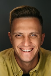 a man with a smile on his face