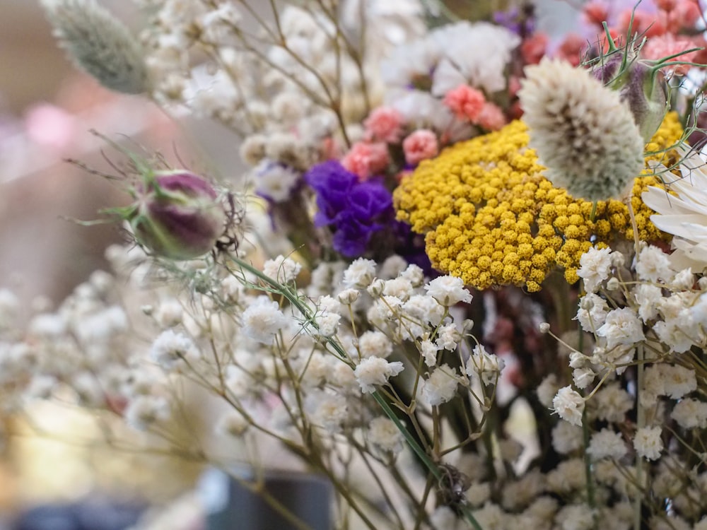 a bunch of flowers that are in a vase