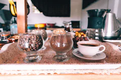 A cup of tinto and coffee beans