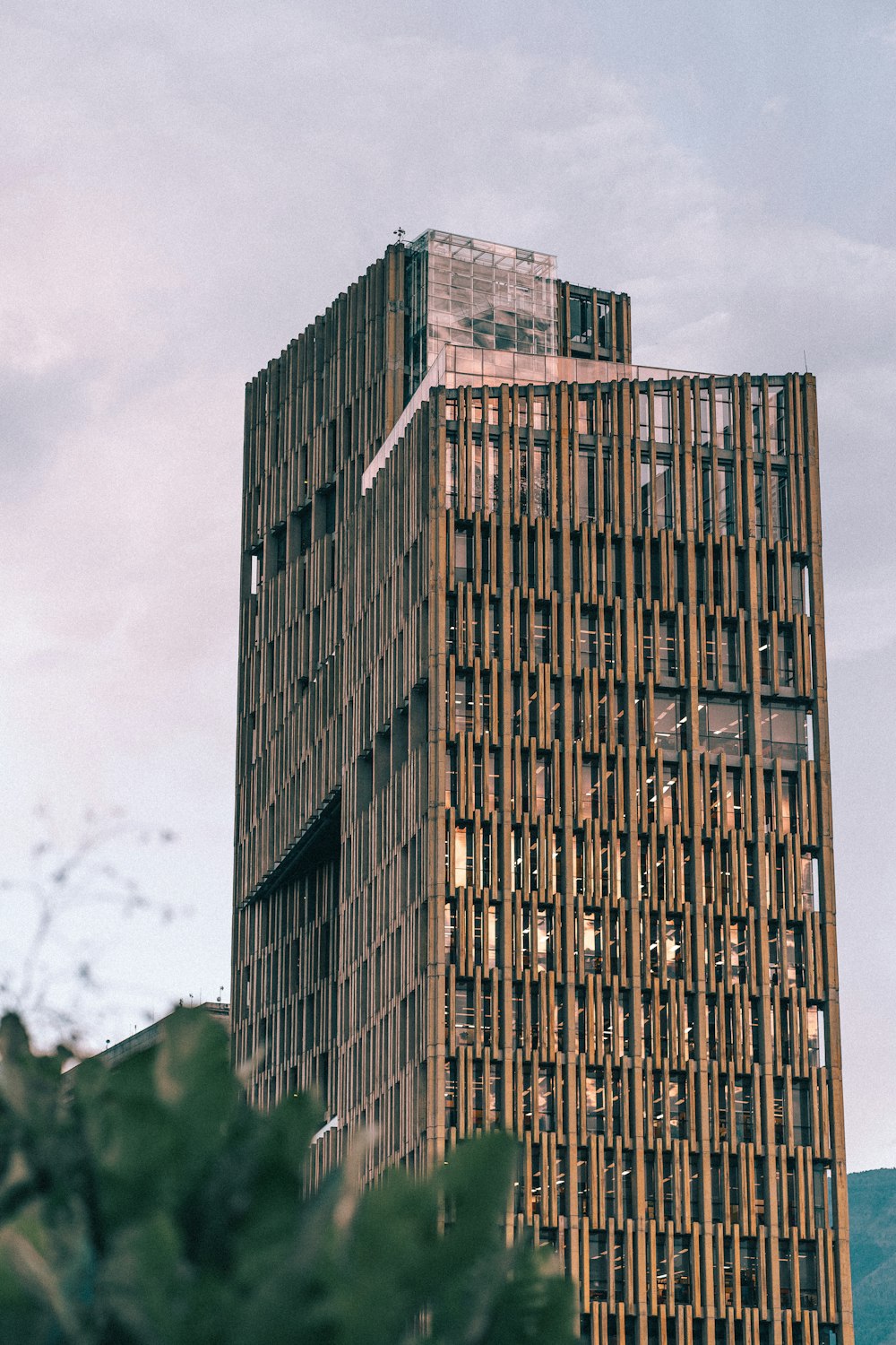 a tall building with a clock on the top of it