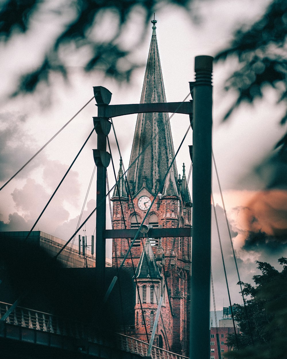 a tall clock tower towering over a city