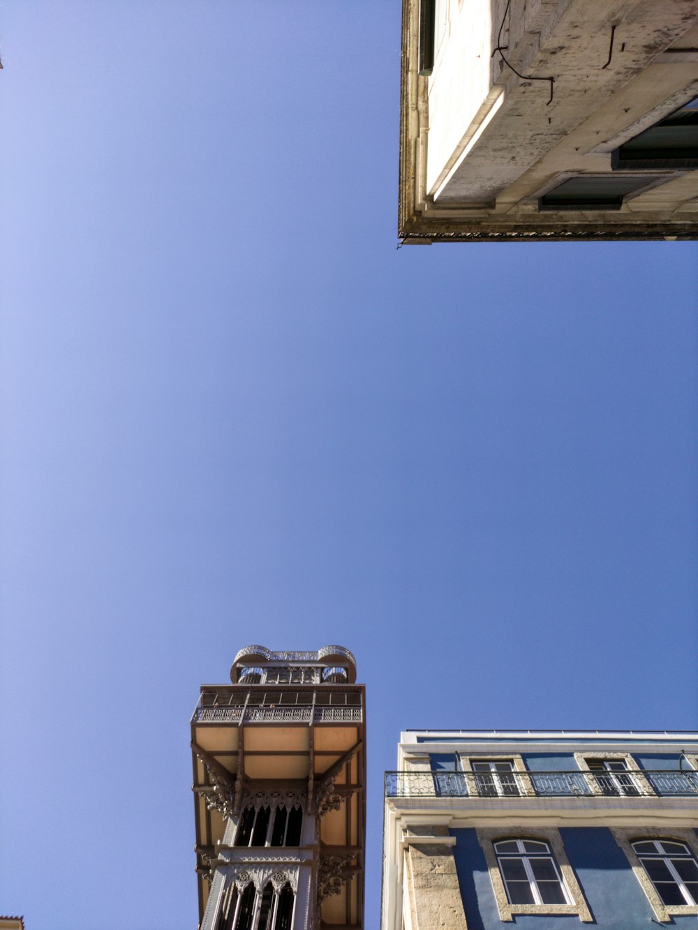 a tall building with a clock on the side of it