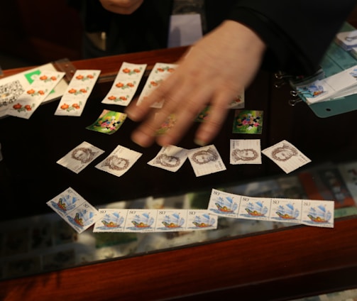 a person playing a game of cards on a table