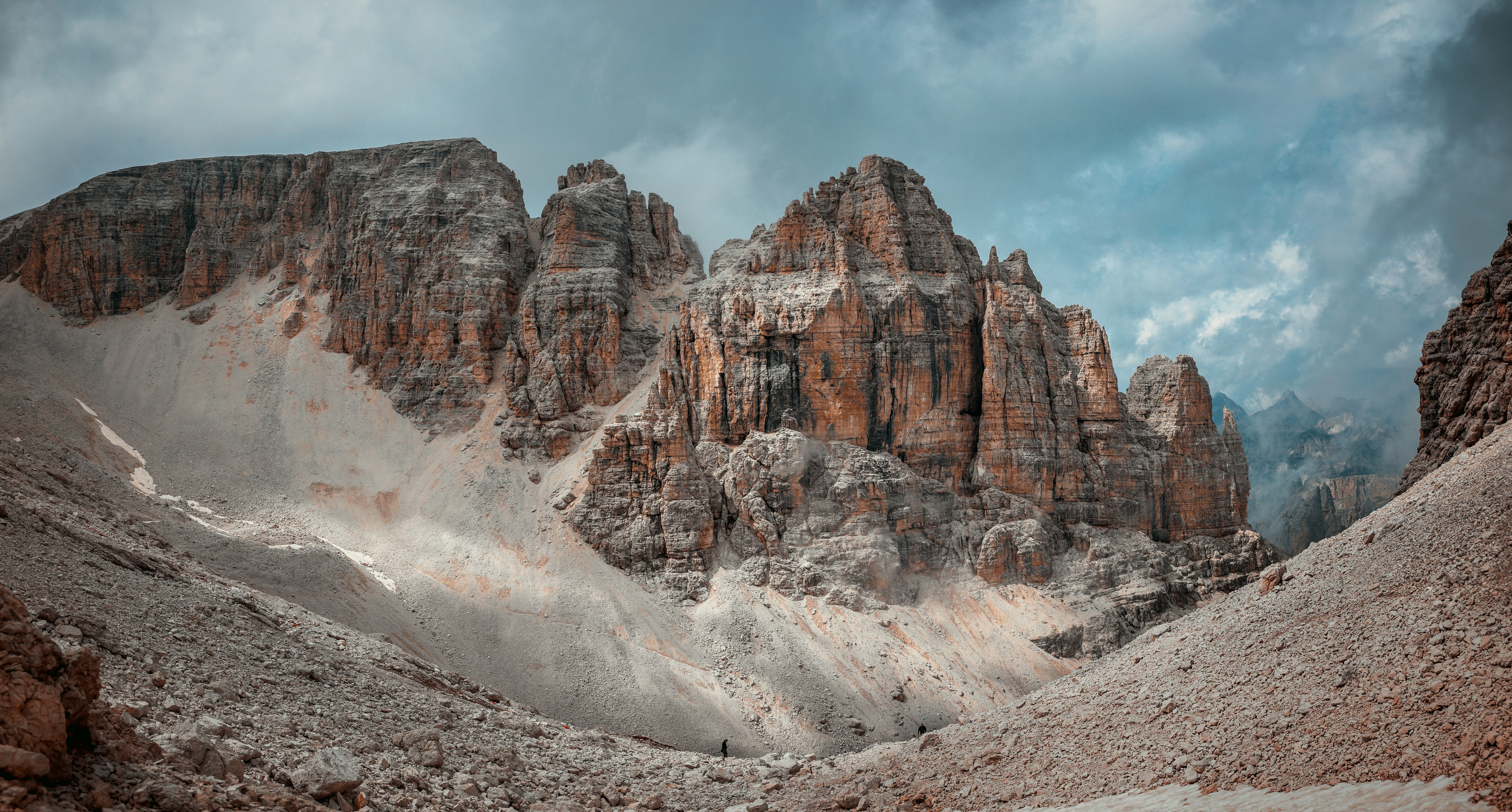 a group of mountains with snow on them
