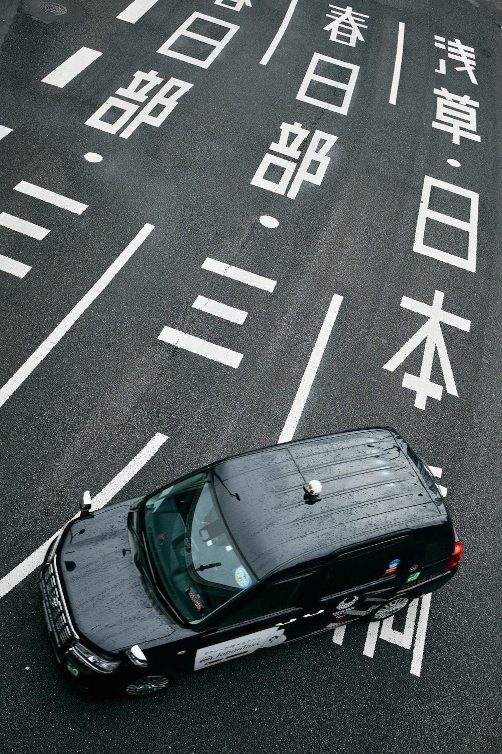 a car is parked on the side of the road