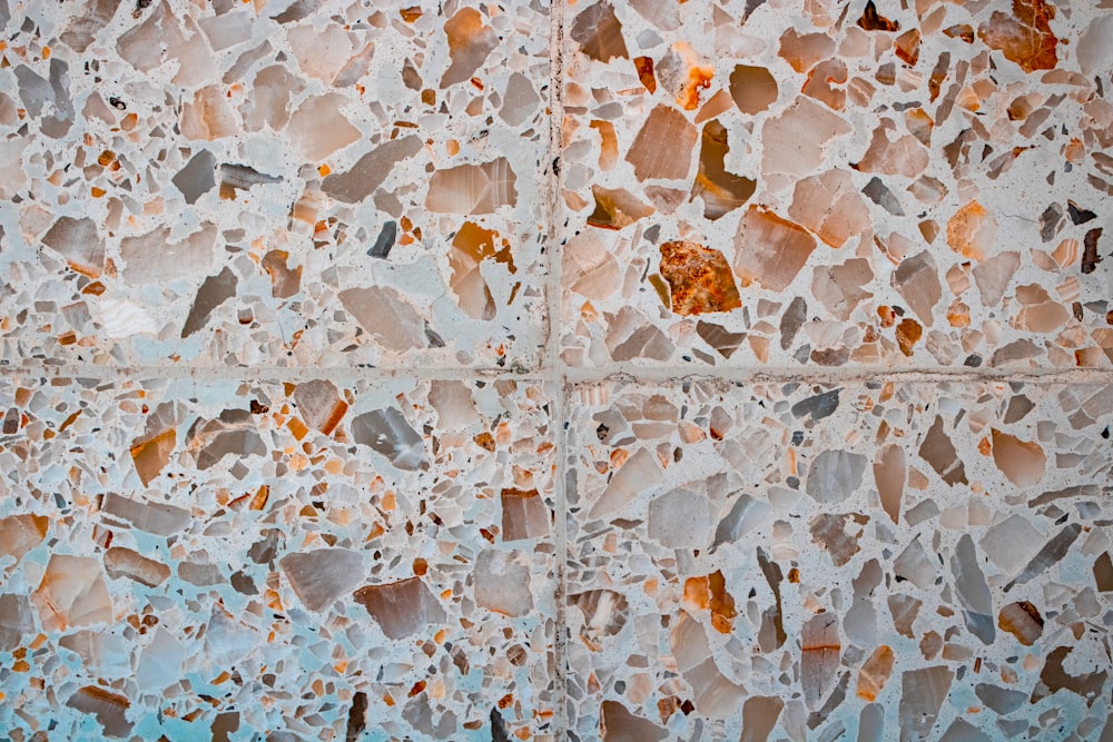 a close up of a wall made of broken glass