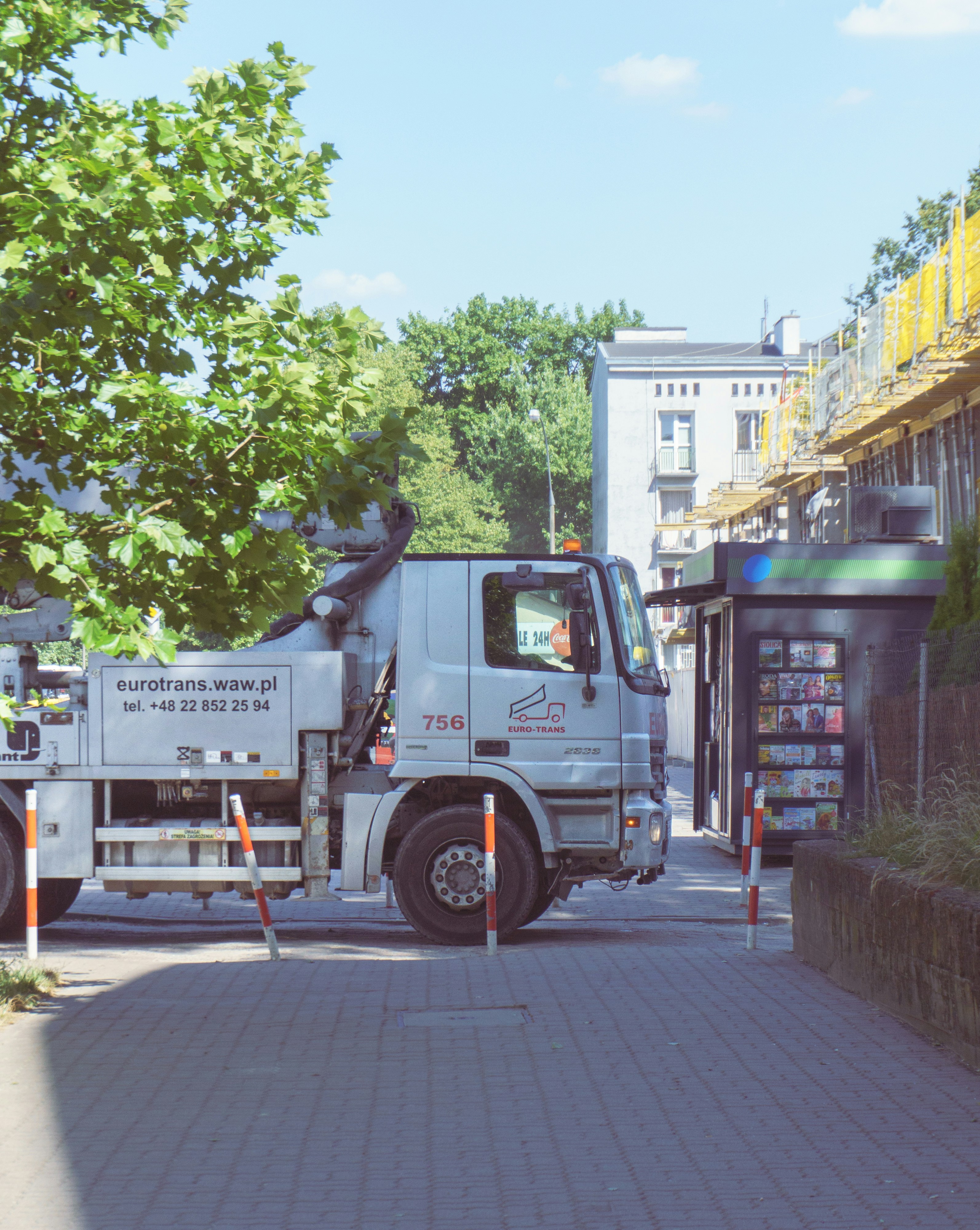 A white truck parked on the side of a road photo – Free Warsaw Image on ...