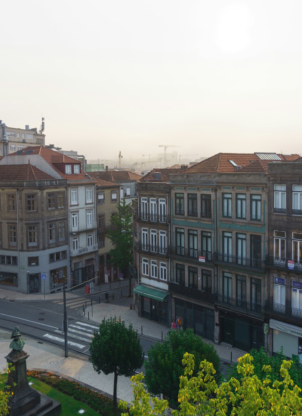 a view of a city street and buildings