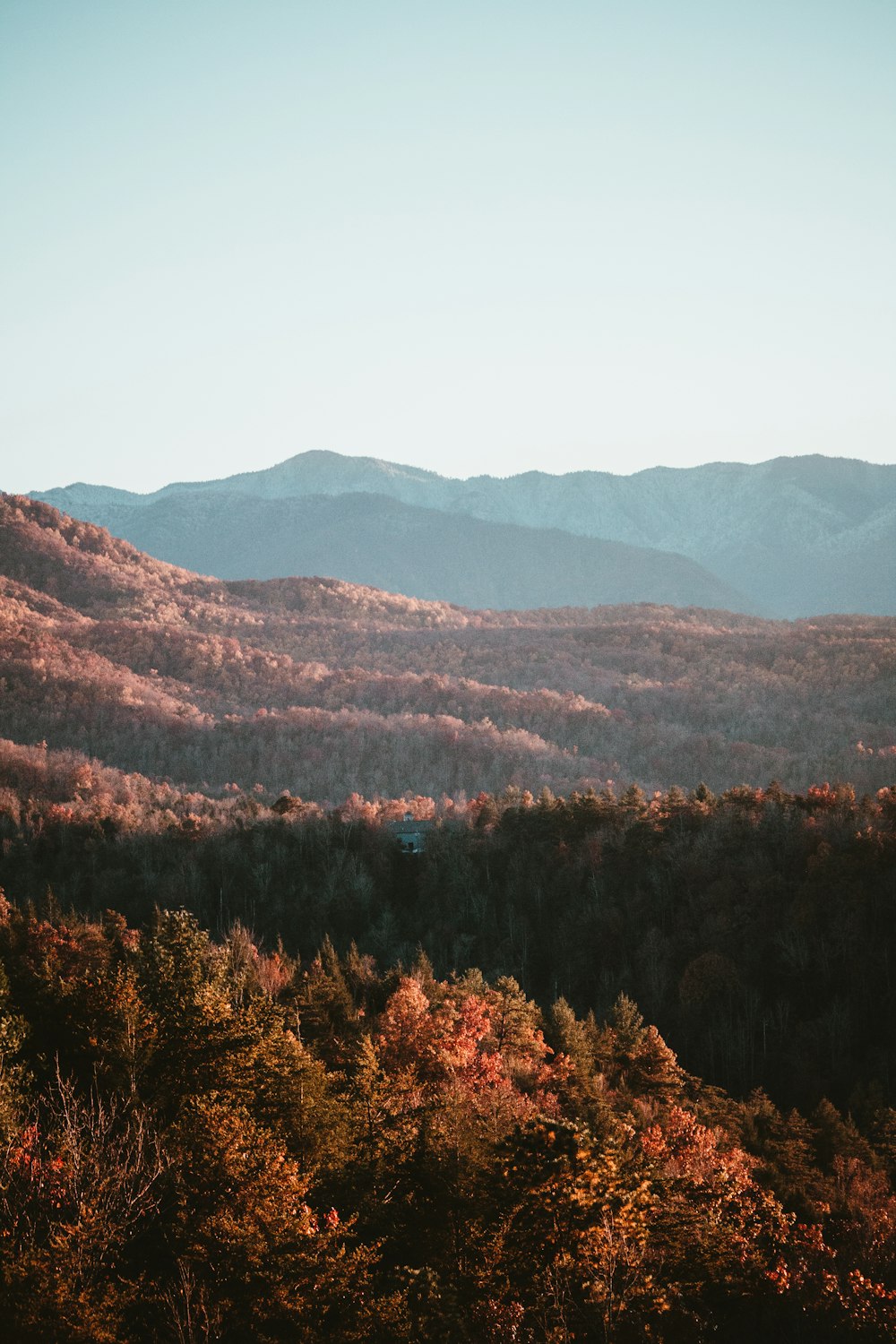 a view of a mountain range in the fall