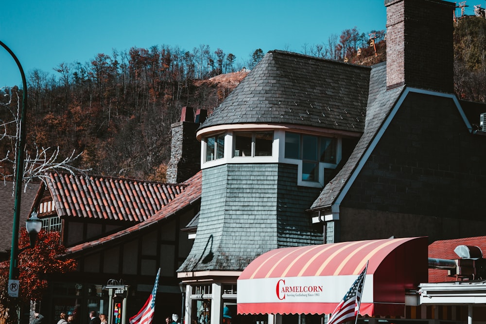 a red and white awning on a building