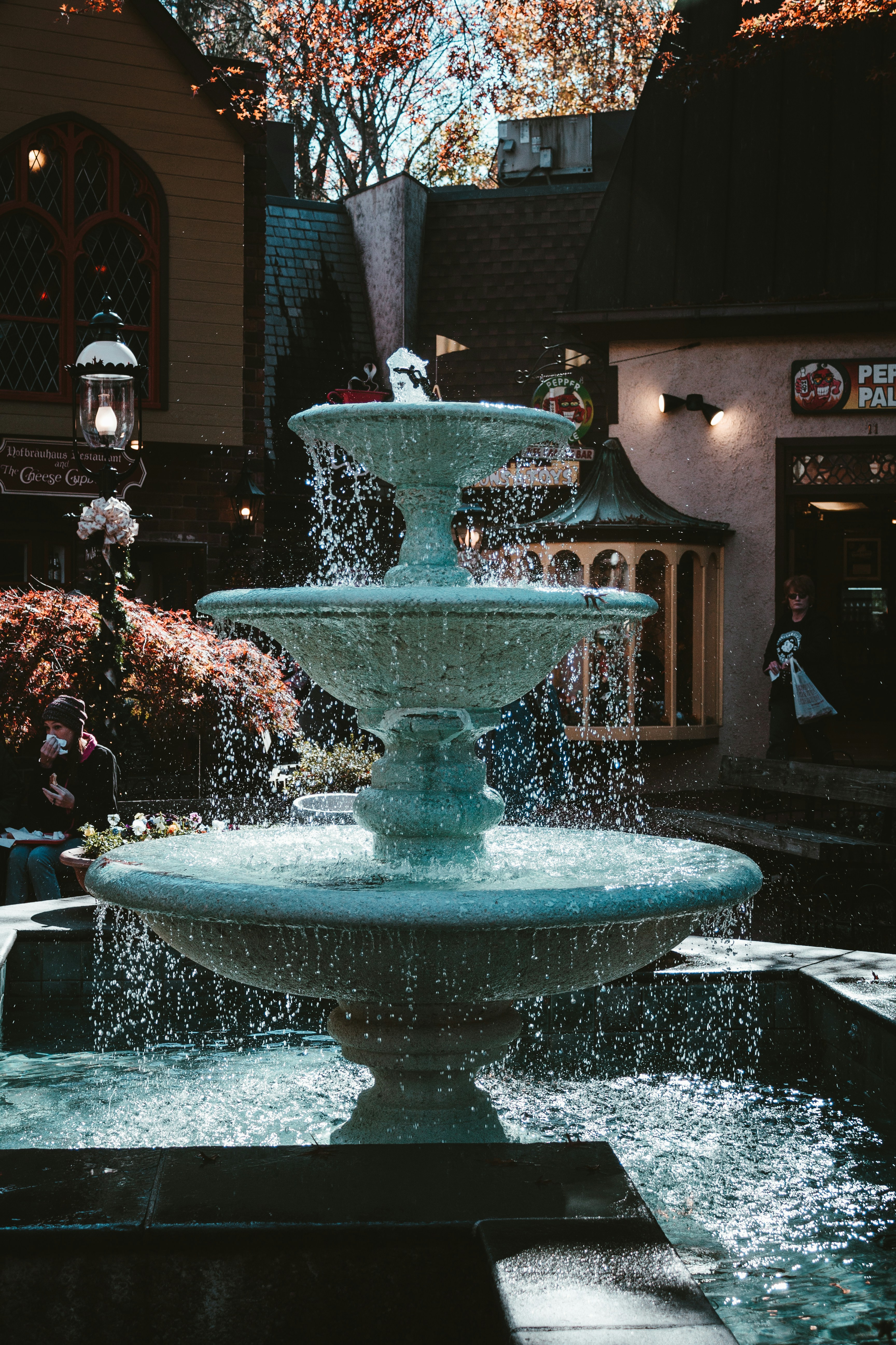 a water fountain in front of a building