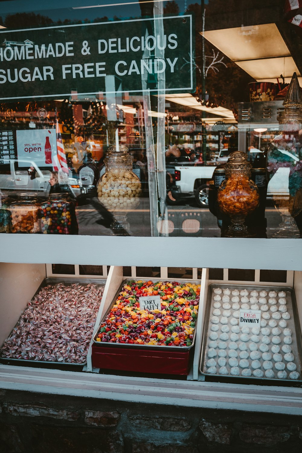 a display case filled with lots of different types of candies