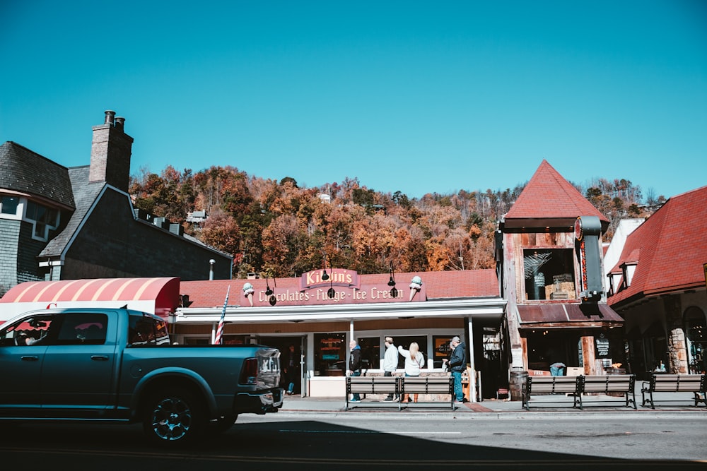 a truck is parked in front of a building