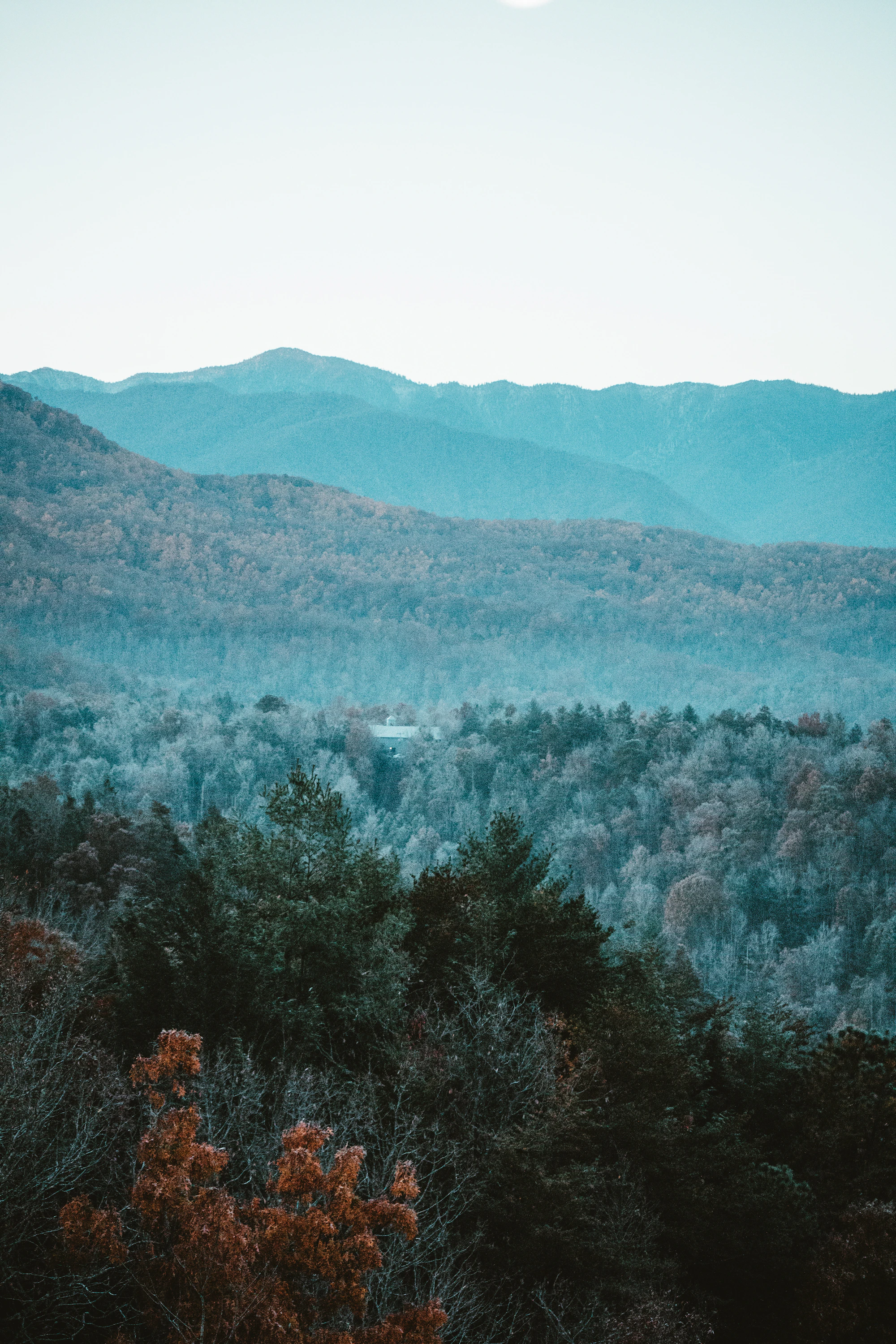 Mountain ridges under a full moon