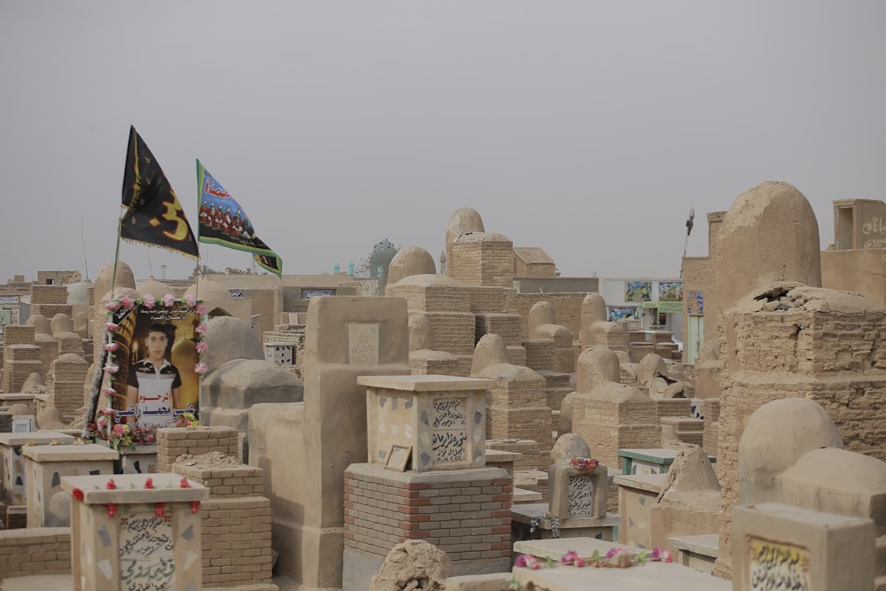 a cemetery with a flag flying in the background