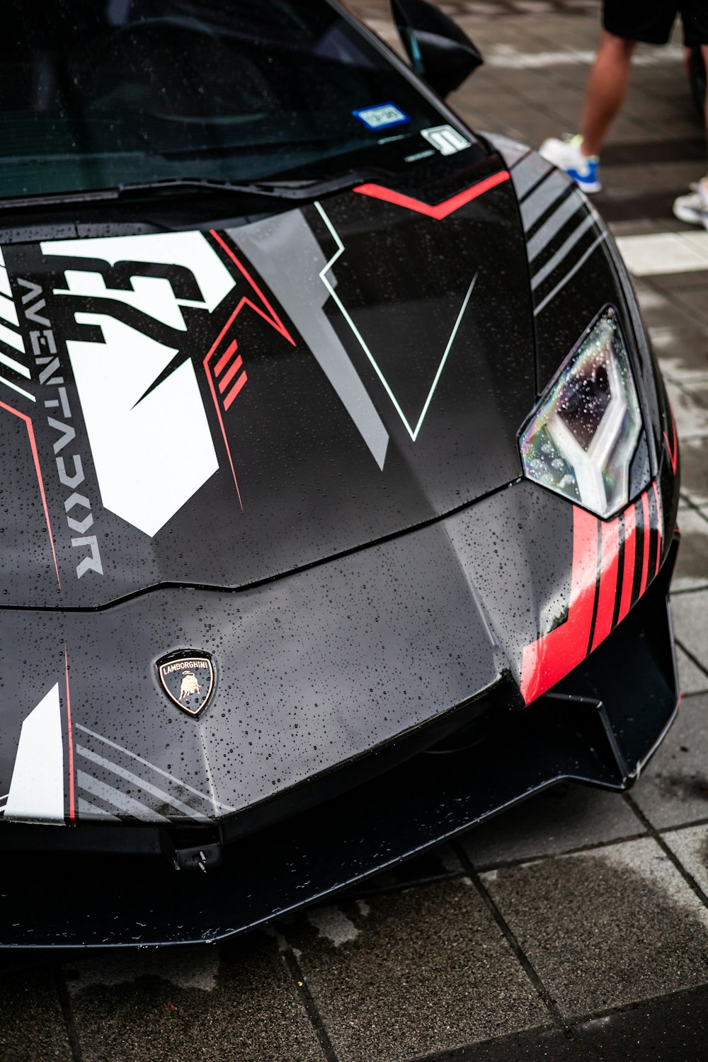 a close up of a black and red sports car