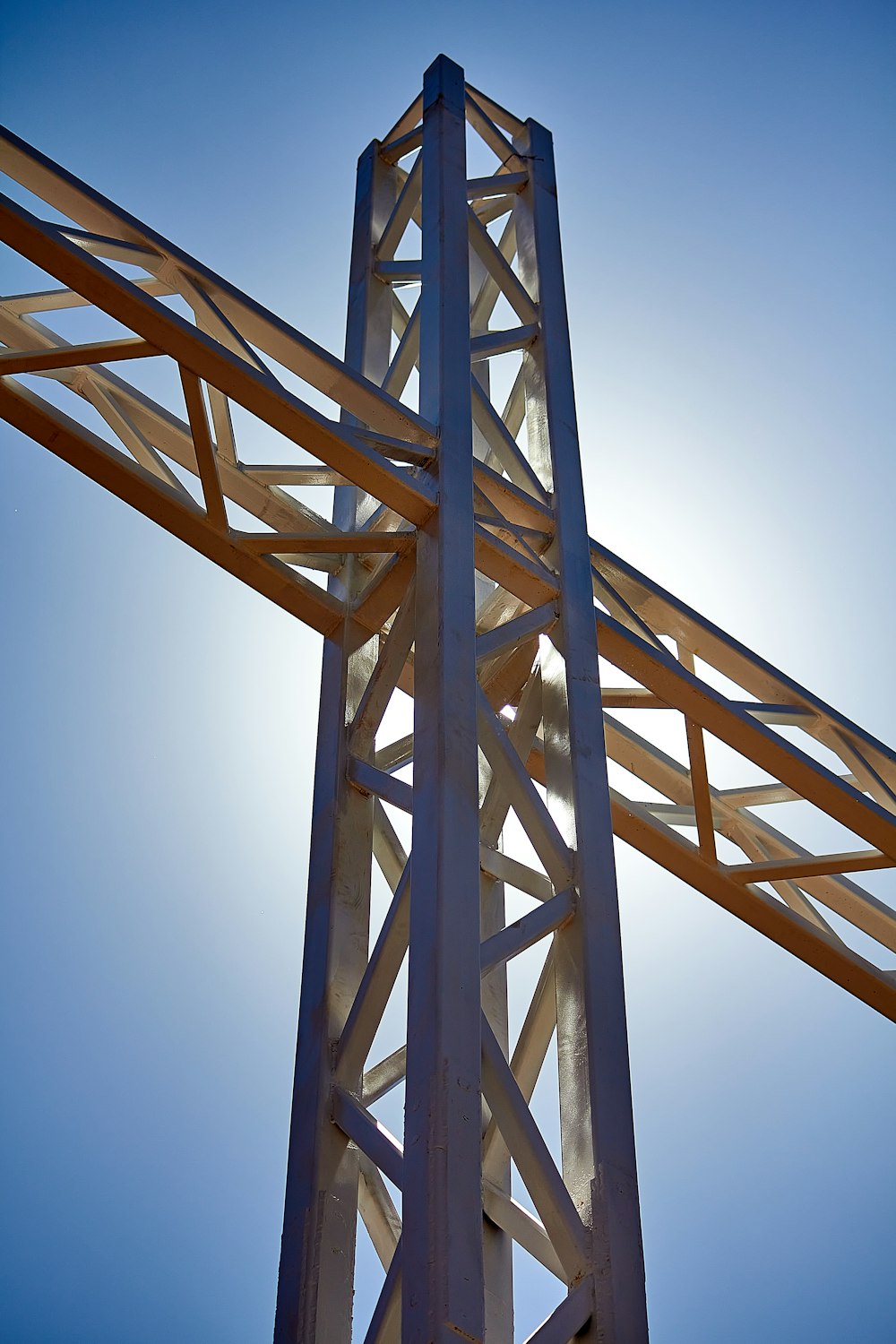 a tall metal structure with a sky background