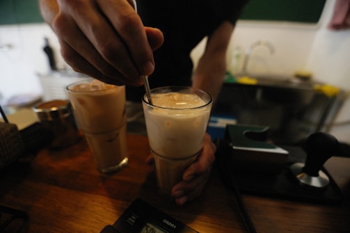 A robotic mixer preparing a personalized beverage.