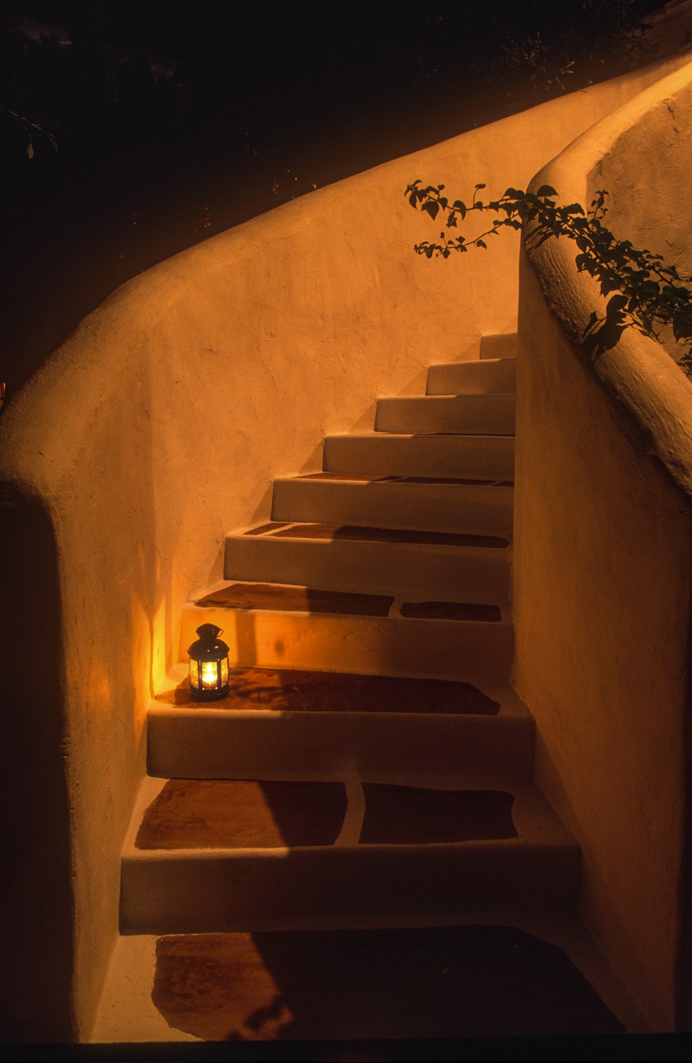 a candle is lit on a set of stairs