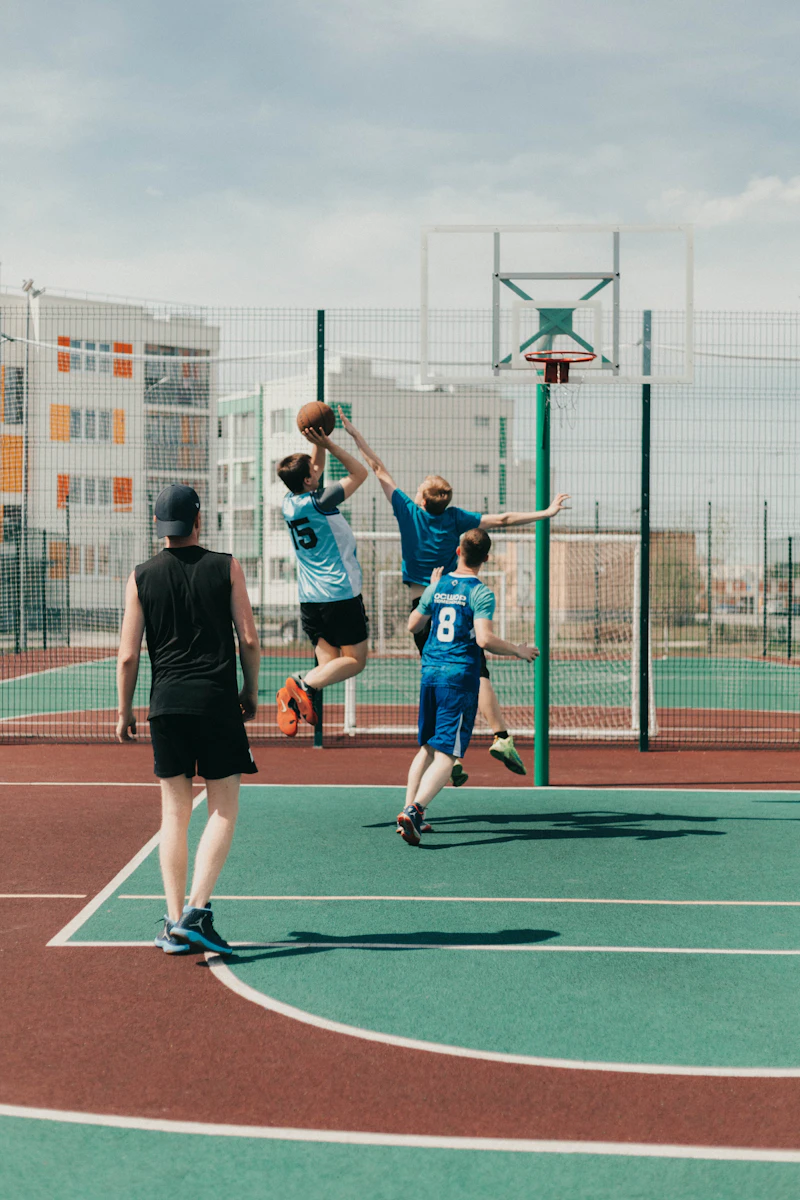 Basketball players in action during a game