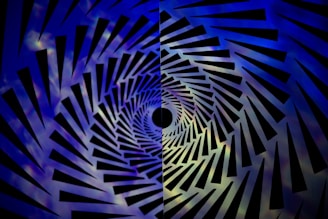 an abstract photo of a blue and black background
