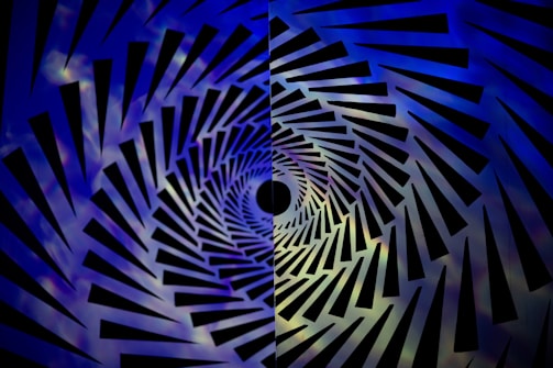 an abstract photo of a blue and black background