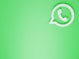 a green wall with a white phone on it
