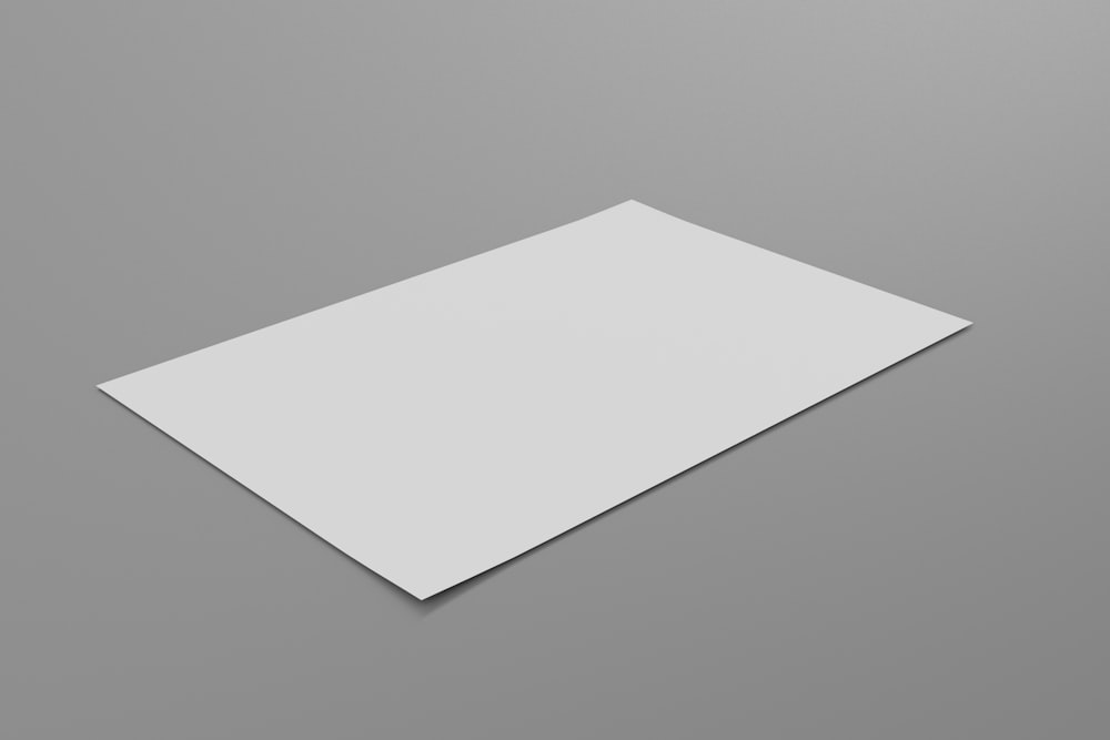a white sheet of paper on a gray background