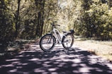 a bicycle parked on the side of a road