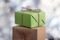 Image of a gift being packed for delivery.