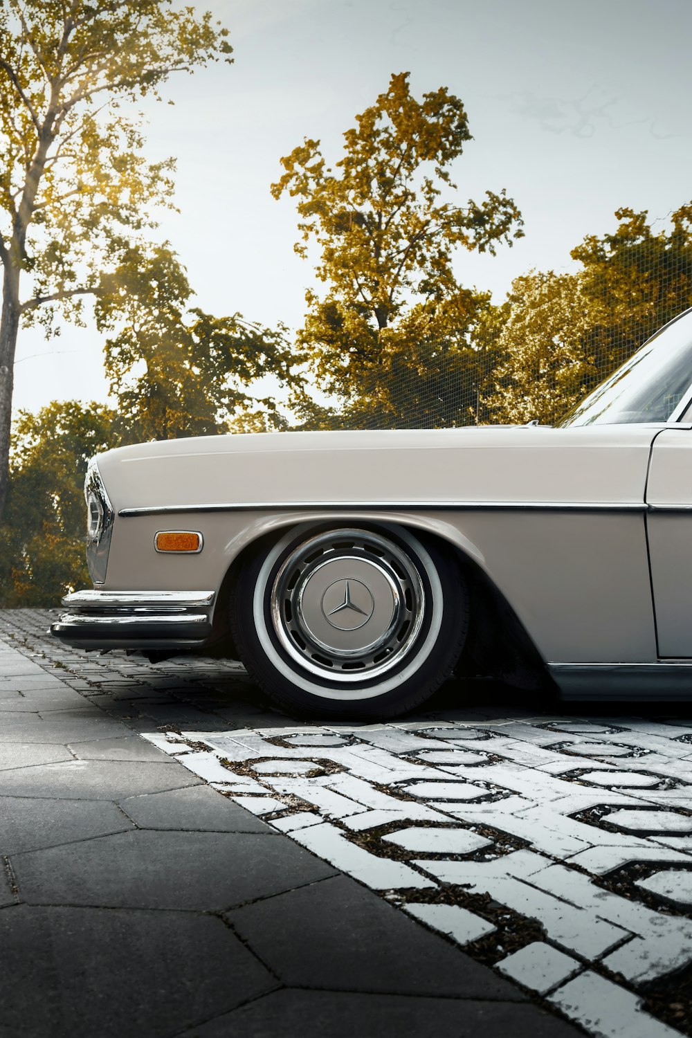 a white car parked on the side of the road