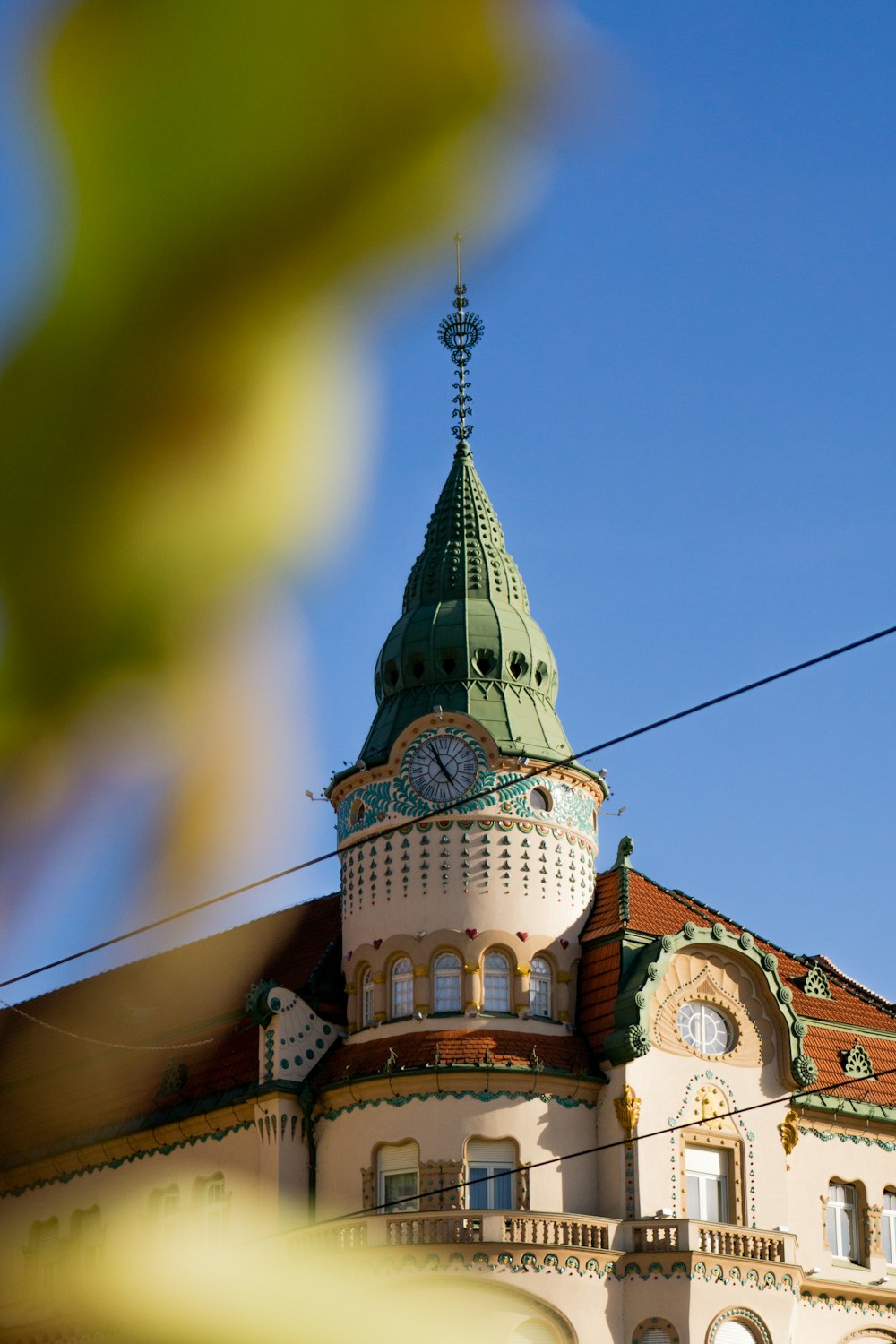 a tall building with a clock on the top of it