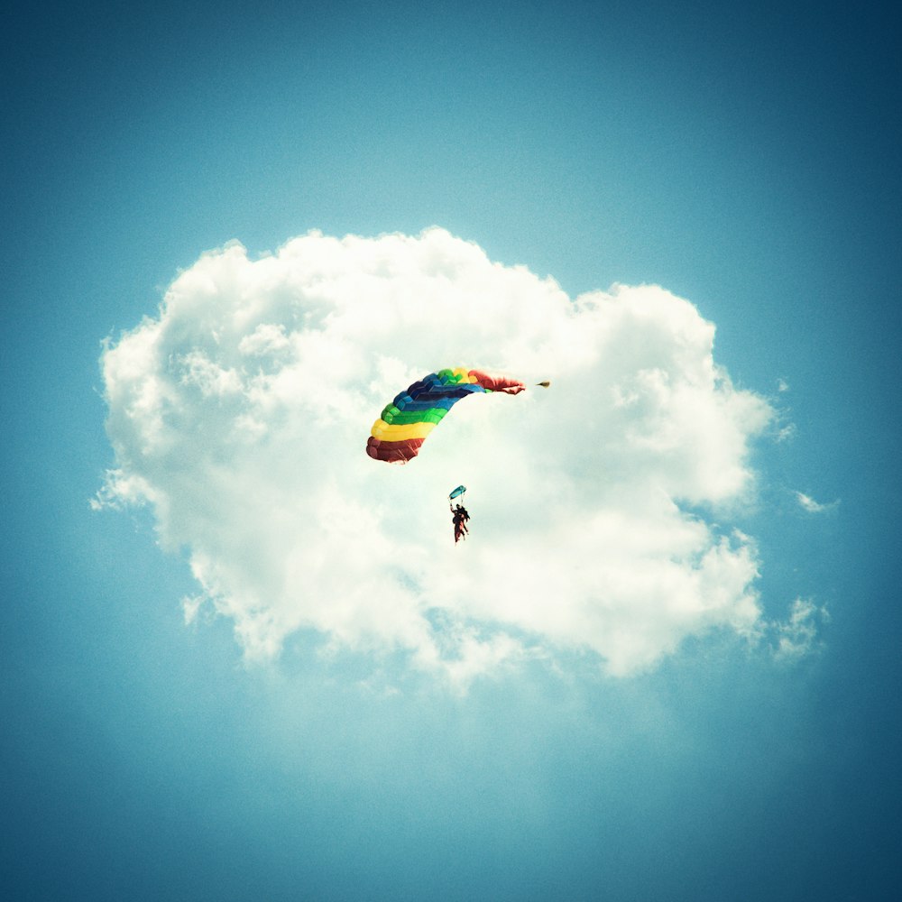 a kite flying in the sky on a sunny day