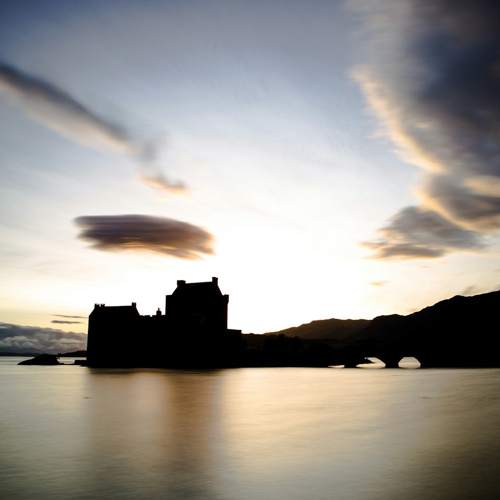 a castle sitting on top of a body of water