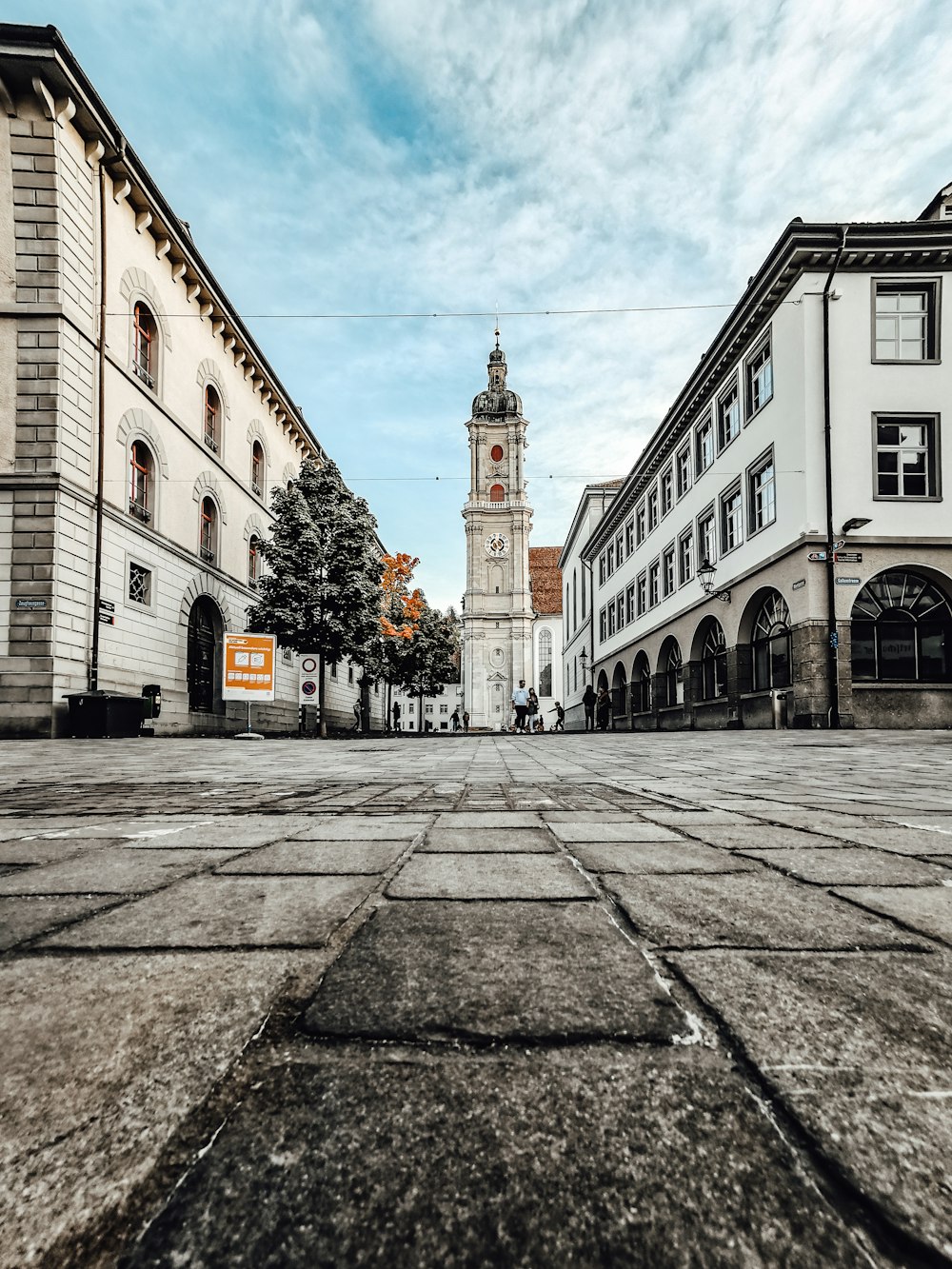 a large clock tower towering over a city