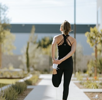 a woman is doing exercises on a yoga mat