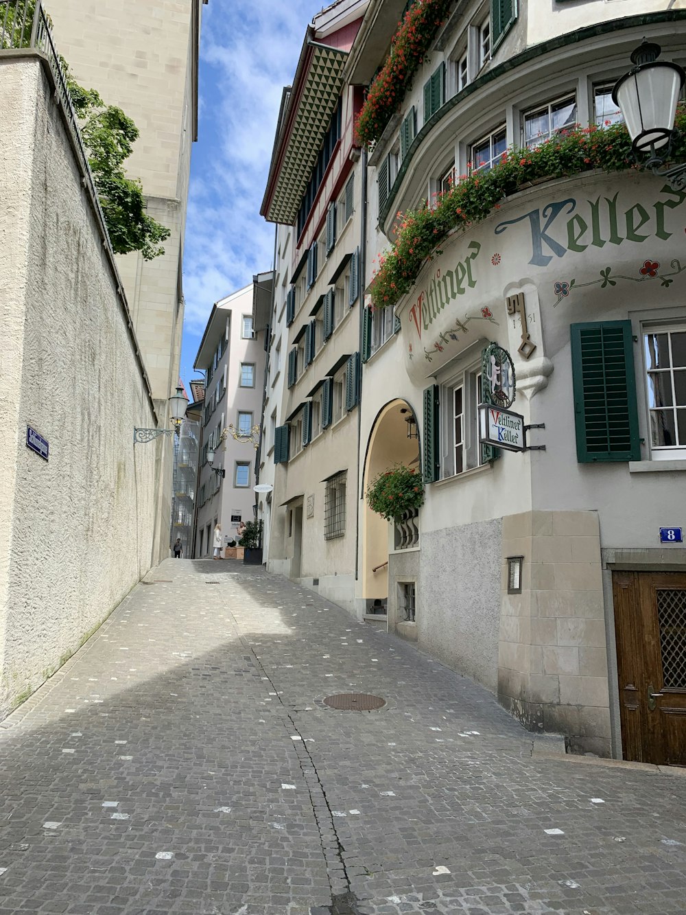 a cobblestone street in a european city