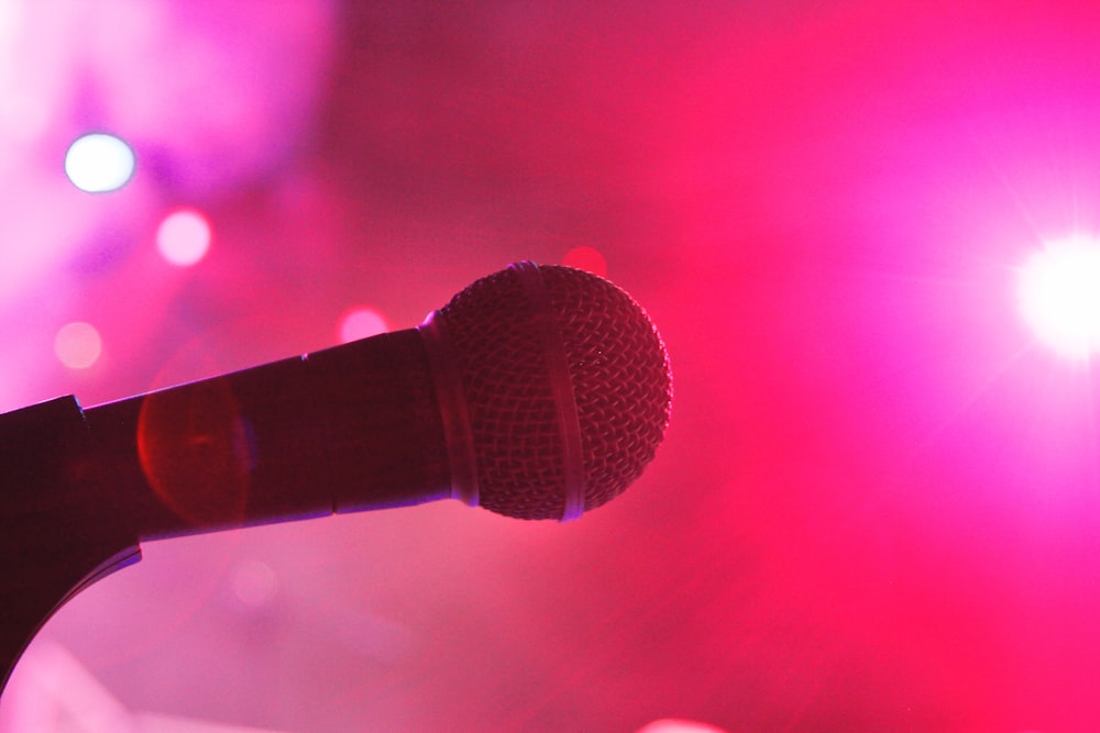 a microphone that is sitting in front of a stage