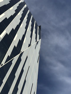 Architectural detail of a contemporary building façade with geometric patterns.