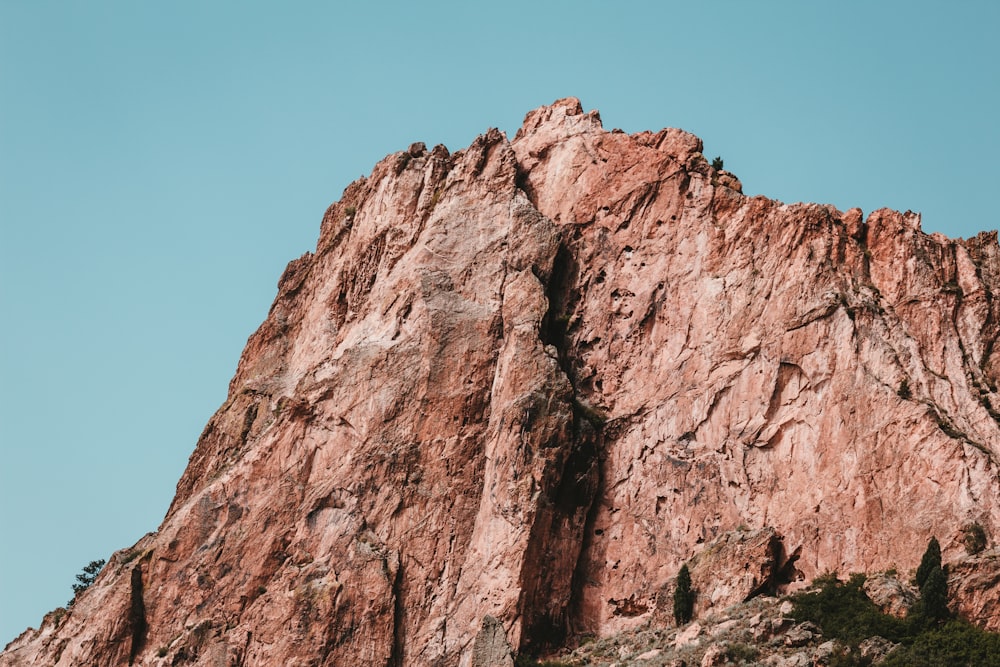 a tall mountain with a sky background