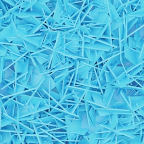 a large pile of blue plastic shards